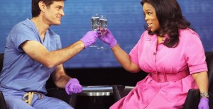 Toasting their success (Dr. Oz and Midas/Oprah), courtesy Deadstate.